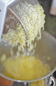 parmesan-mashed-potatoes-ricing-potatoes